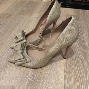 Betsey Johnson Gold Heels with Bow Embellishment